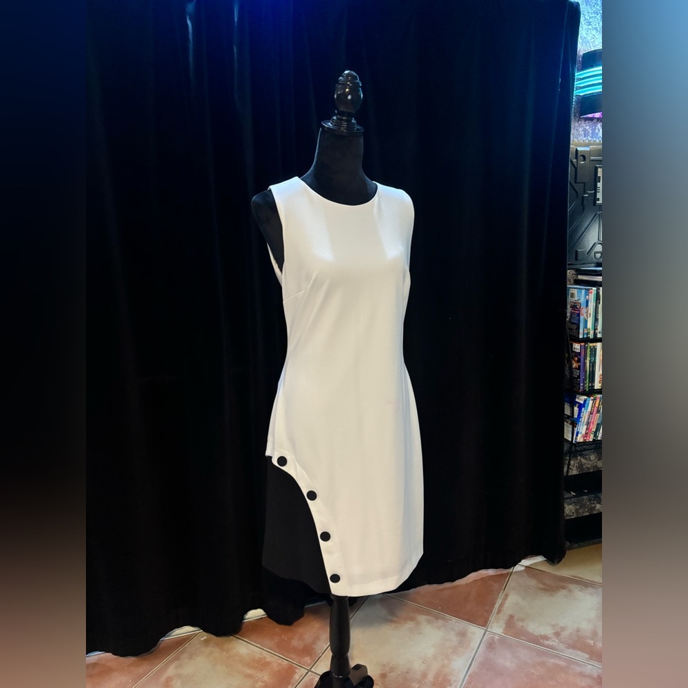 Donna Karan sleeveless, black, and white dress with buttons